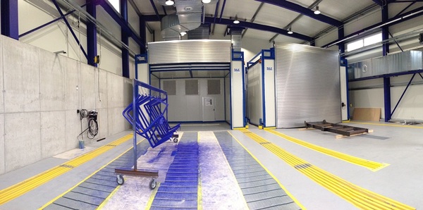 Instalación de pintura en espacio abierto con secador telescópico
